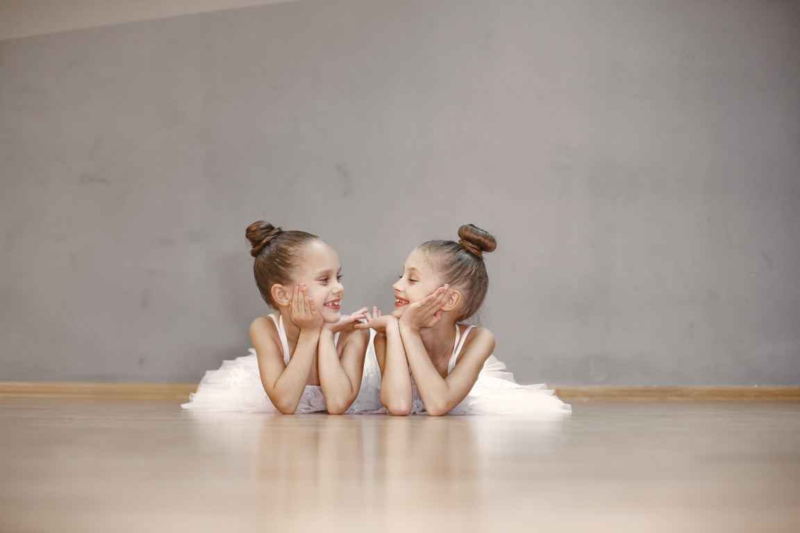 Ballerinas Lying Down on the Floor